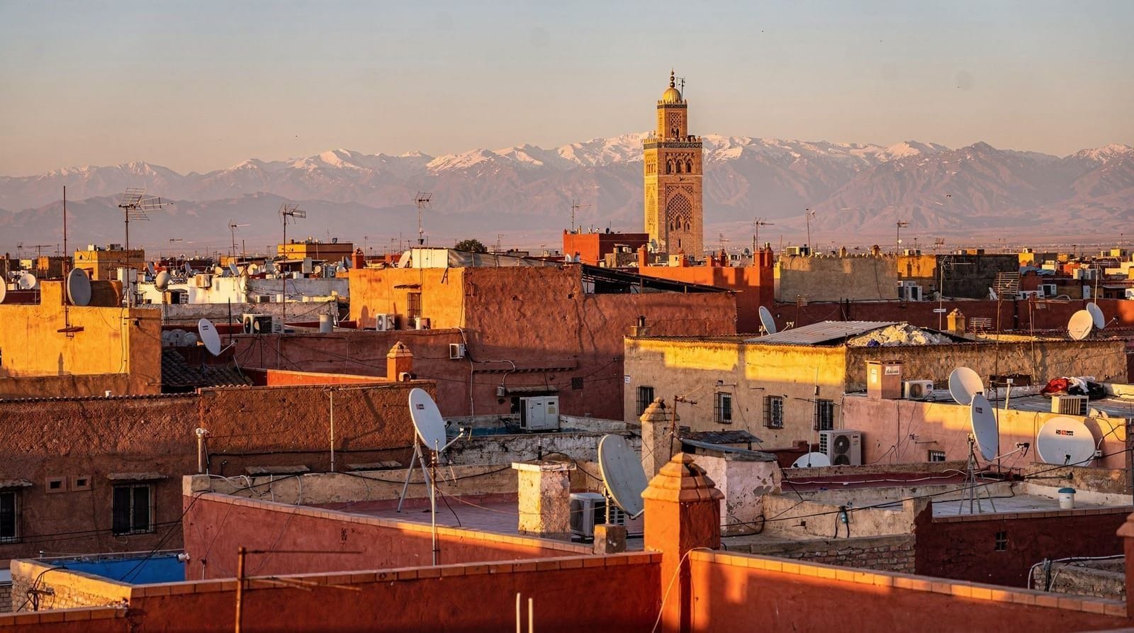 Jemaa el-Fna square and the Koutoubia minaret in Marrakech at dusk